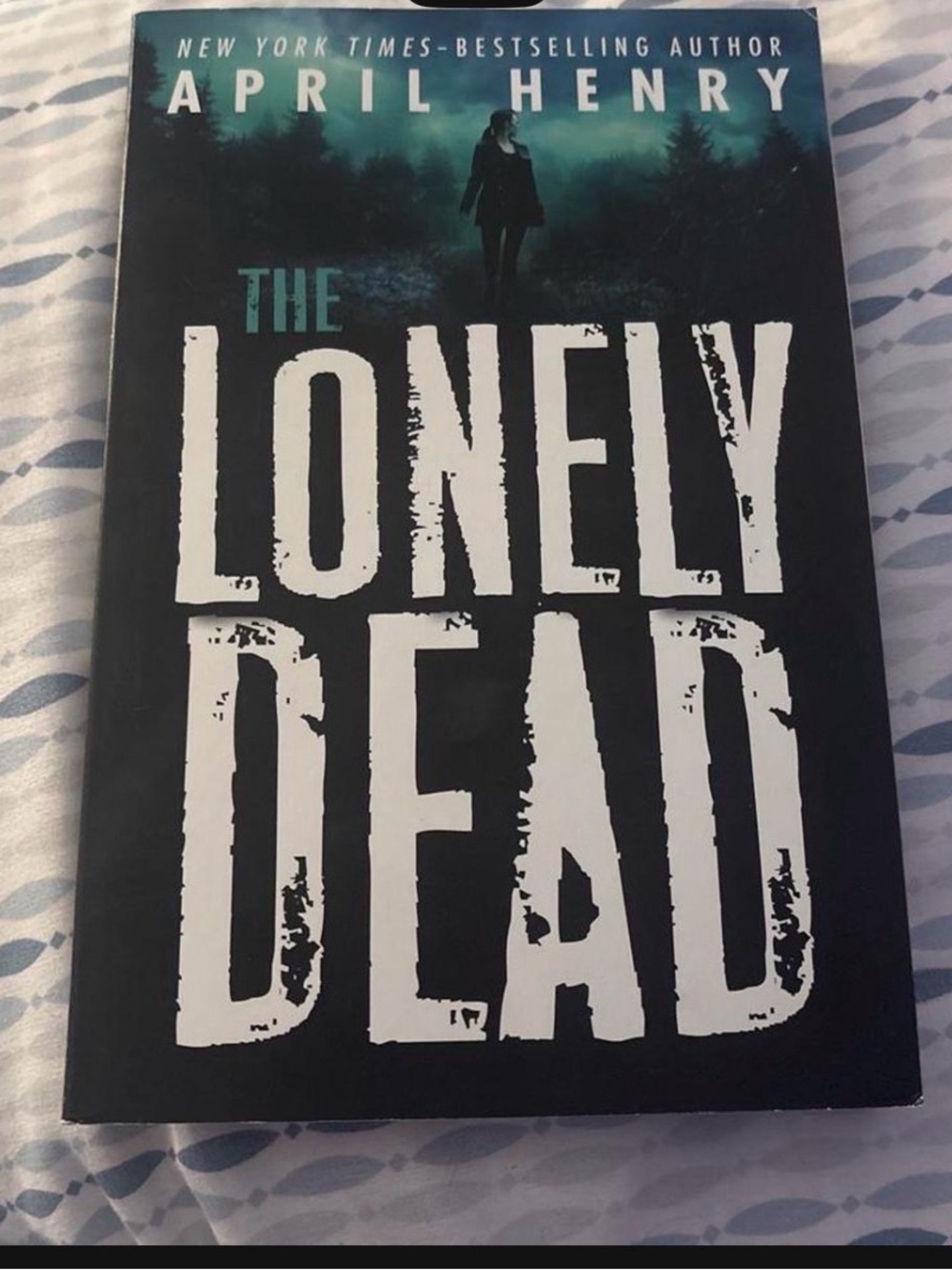 Scholastic Paperback Book with Black and Teal Cover - The Lonely Dead